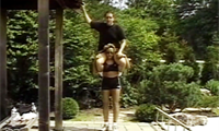 Lisa puts Dave, who is about twice her weight, through a long series of lifts, including calf raises, front lifts, piggyback rides, shoulder carries, fireman's carries and many more. She never even gets winded.