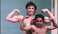 Boy-Girl twins Deep and Cristiana Arcosanti, were separated at birth. For family reasons, he was sent to England and her to Italy. As gender classes are done away with, in the World Federation of Bodybuilding, men and women compete against one another as equals. Deep and Cristiana go through sequences of mixed posing and body parts comparisons while preparing for the Mount Olympus competition. Also included are some light and playful wrestling. Cristina is played by Italian professional bodybuilder, Cristiana Del Buono.